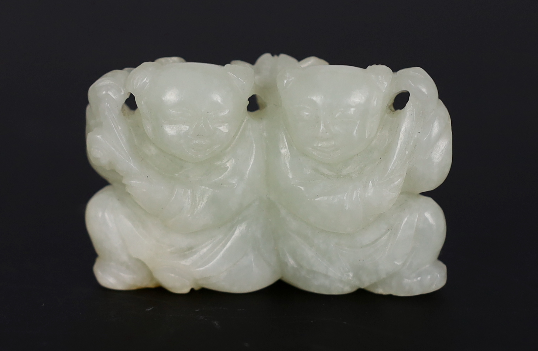 A Chinese pale celadon jade carving of the He He Erxian twins, 18th/19th century